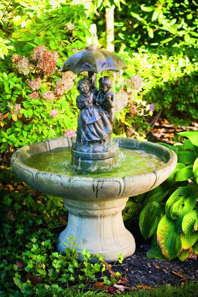 One Tier Fountain with Girl and Boy Under an Umbrella